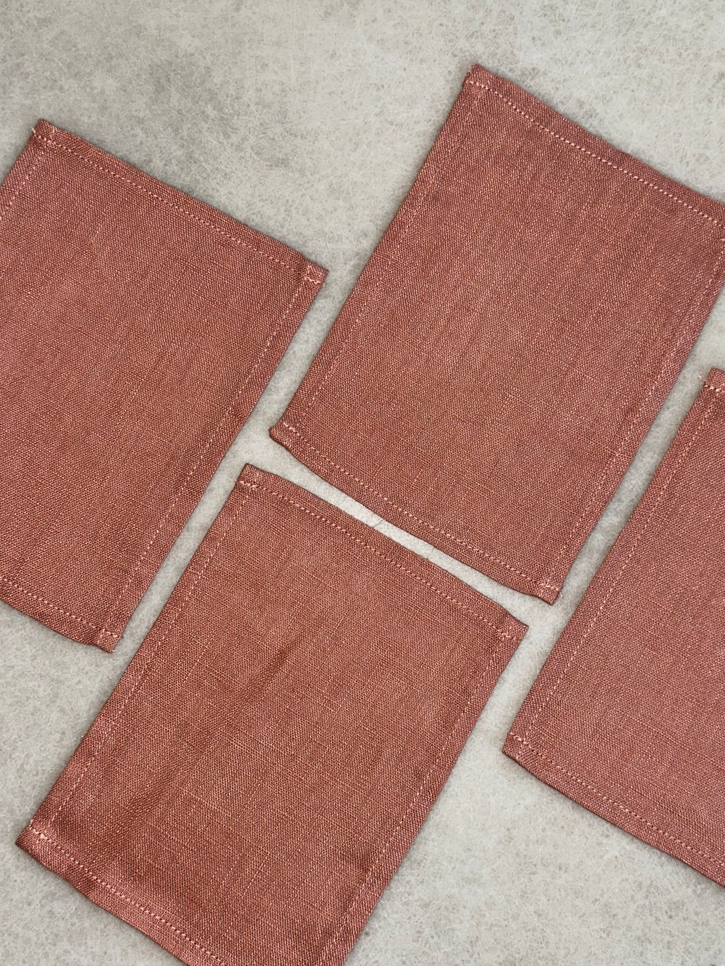 Nora Holiday linen coasters (Terracotta)